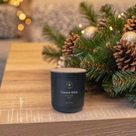 Coastal Wilds luxury soy candle featuring fir, cedar and moss notes, hand-poured by Sonas Óir in BC.