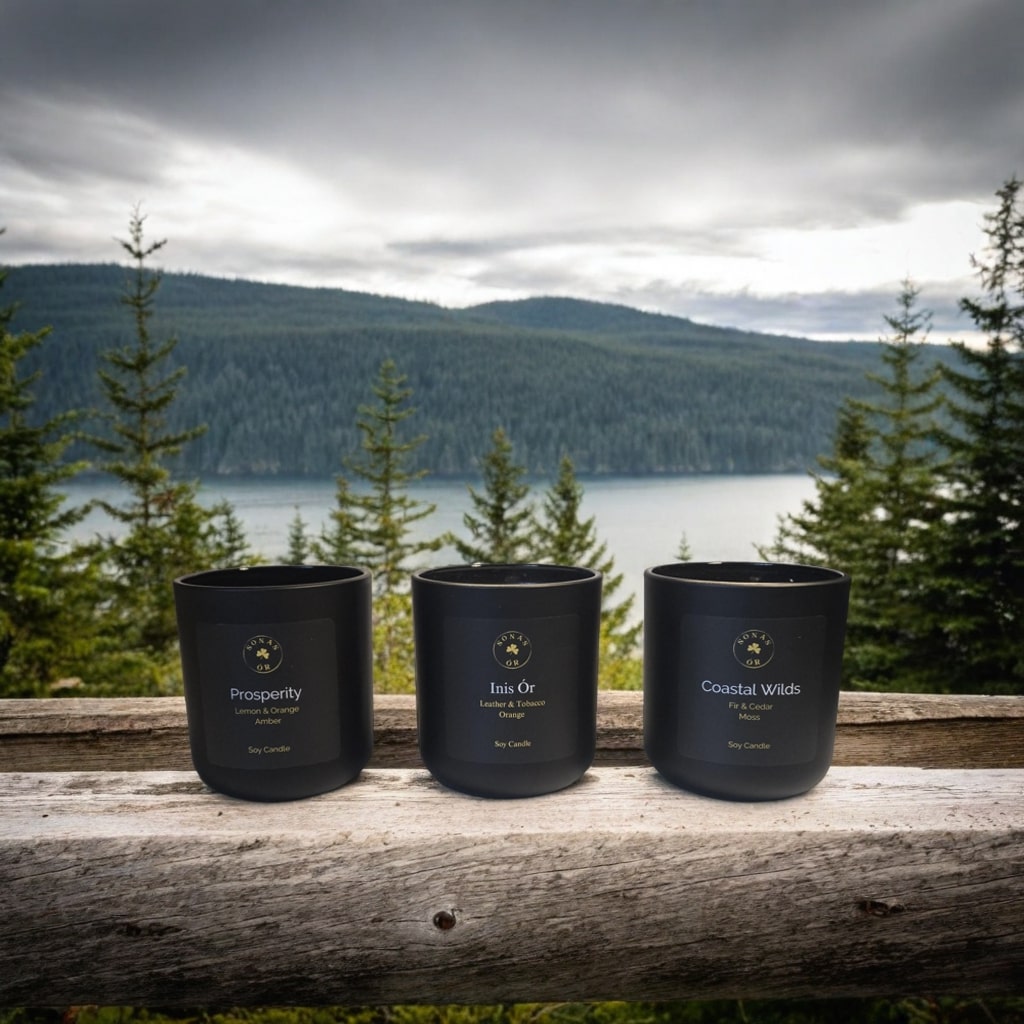 Trinity of Ór [Gold] signature luxury soy candle collection, hand-poured by Sonas Óir and captured in a BC forest setting.